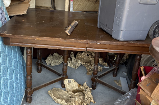 Oak extendable dining table in Jacobean Revival style