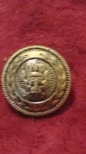 Brass blazer button with eagle and crown motif by Waterbury Button Company