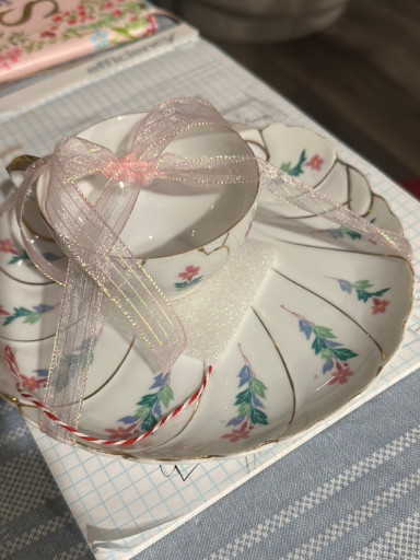 Porcelain snack plate and cup set with floral decoration by Noritake