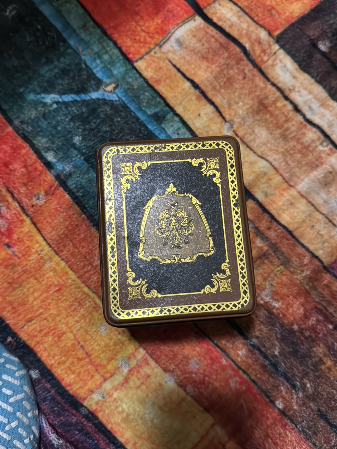 Vintage decorative tin canister by J.L. Clark Manufacturing Company