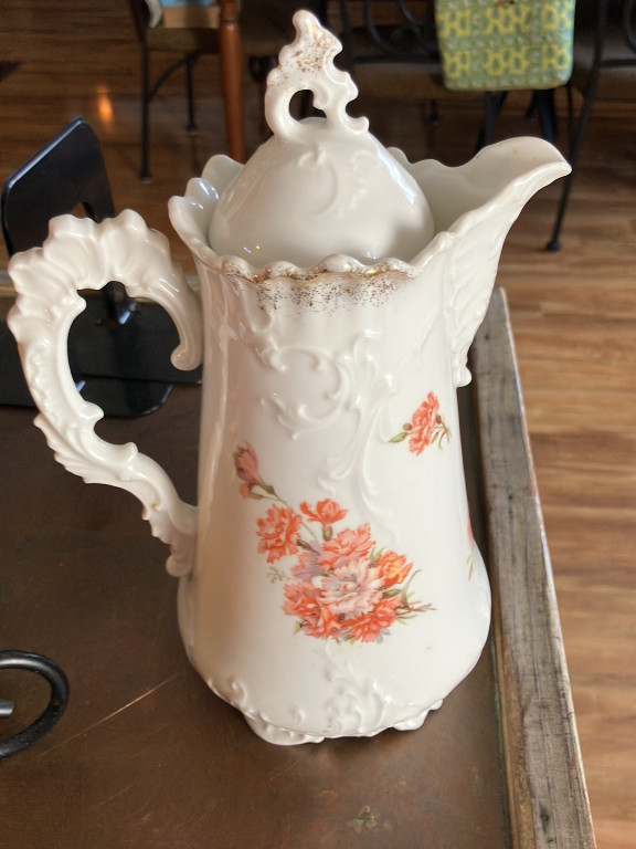 Porcelain chocolate pot with floral decoration, likely German manufacture