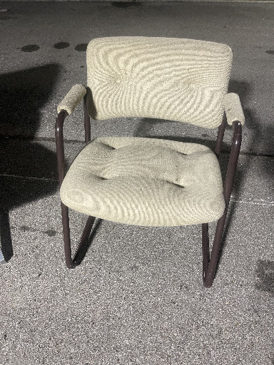 Mid-century modern cantilever chair with tubular chrome frame and upholstered seat and back in milk chocolate finish, manufactured by Steelcase