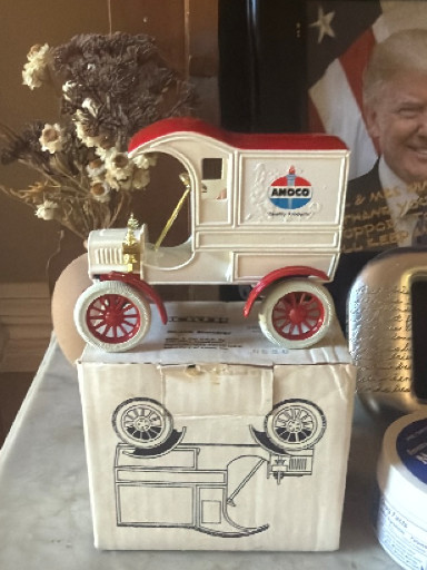 Die-cast metal 1905 Ford delivery car bank by ERTL, AMOCO branding