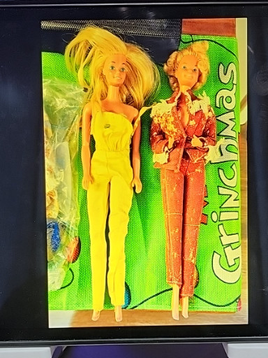 Vintage Mattel Barbie dolls from the 1960s-1970s era, including a Twist 'N Turn model in yellow jumpsuit