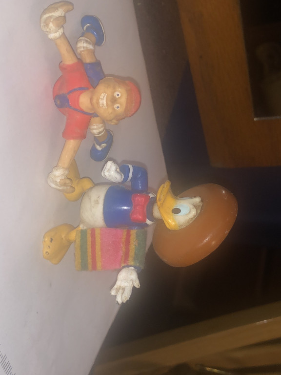 PVC figurines of Donald Duck and Pluto from Disney