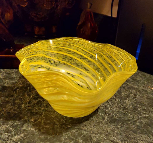 Hand-blown art glass bowl in yellow with spotted pattern