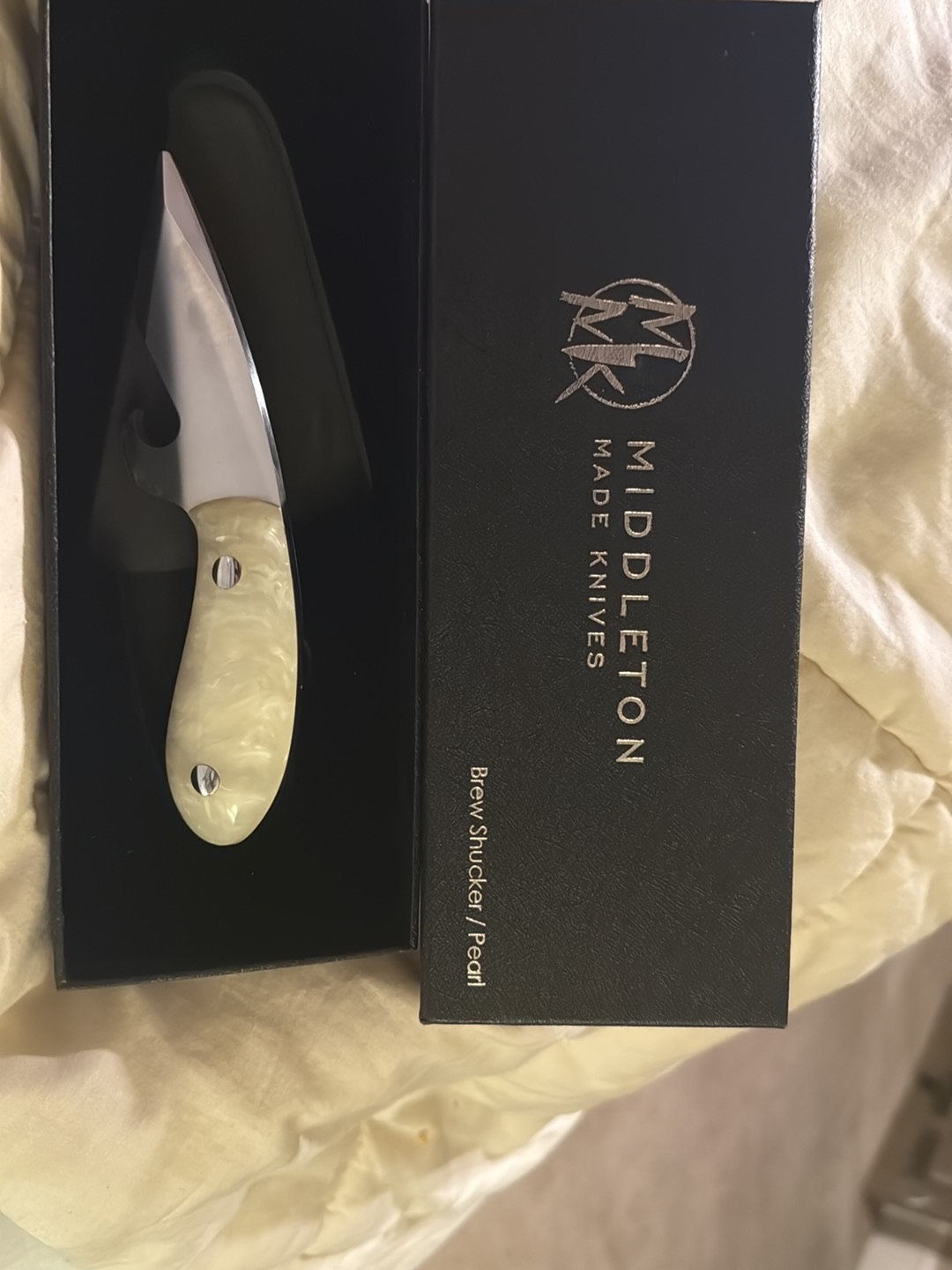 Folding knife with mother-of-pearl handle by Middleton Made Knives