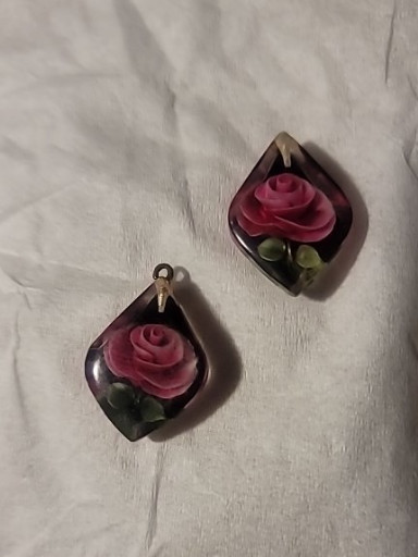 Reverse-carved lucite pendants with red rose motif