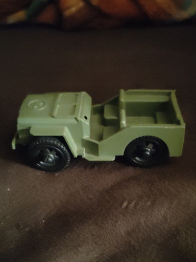 Plastic toy military jeep by Tim-Mee Toys