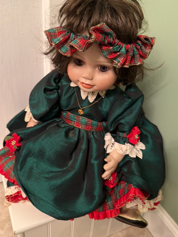 Porcelain doll titled 'Olive May Christmas' by Marie Osmond