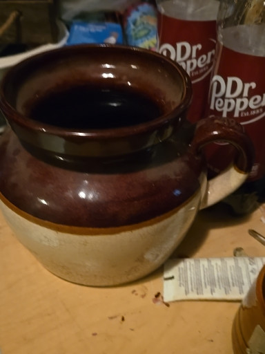 Stoneware bean pot with lid and handle, marked 'USA'