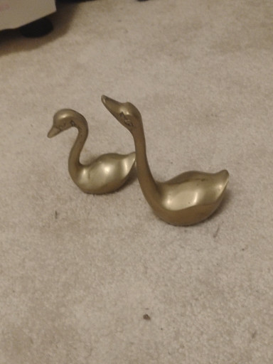 Pair of brass swan figurines