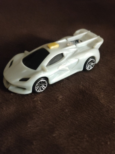Plastic toy car from McDonald's 'Fast and Furious Spy Racers' Happy Meal promotion by UCS LLC