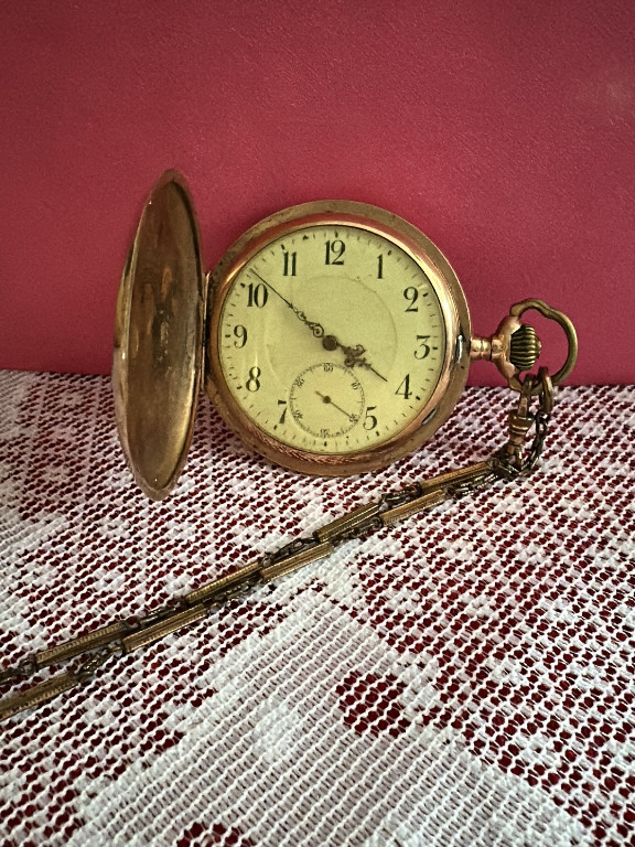 Gold-filled hunting case pocket watch with chain