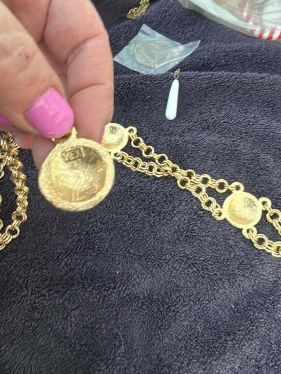 Gold-tone metal chain necklace with medallion charms featuring '31 Rue Cambon' inscription by Chanel