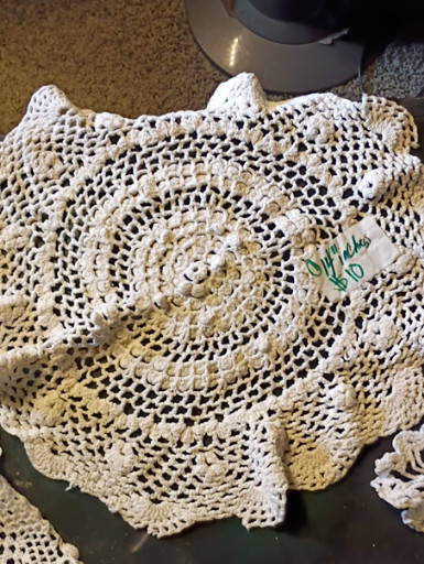Vintage handmade crochet doily in cream and yellow cotton with pineapple pattern
