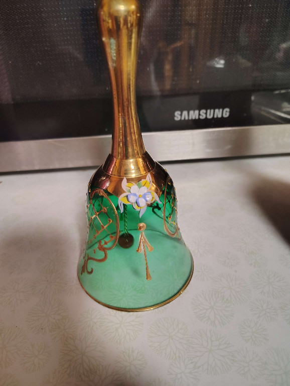 Murano glass bell with emerald green base and gold decorative elements