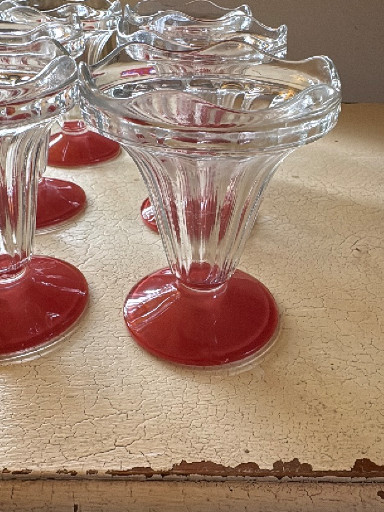 Clear glass ice cream sundae dishes with red bases, French manufacture