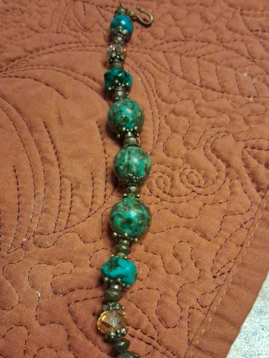 Turquoise and silver beaded bracelet