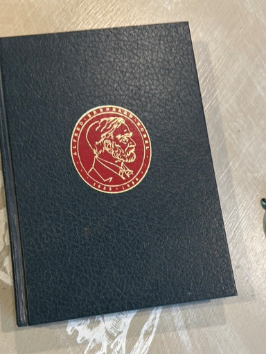 Hardcover book 'Nobel Prize Library' featuring Ernest Hemingway, Knut Hamsun, and Hermann Hesse