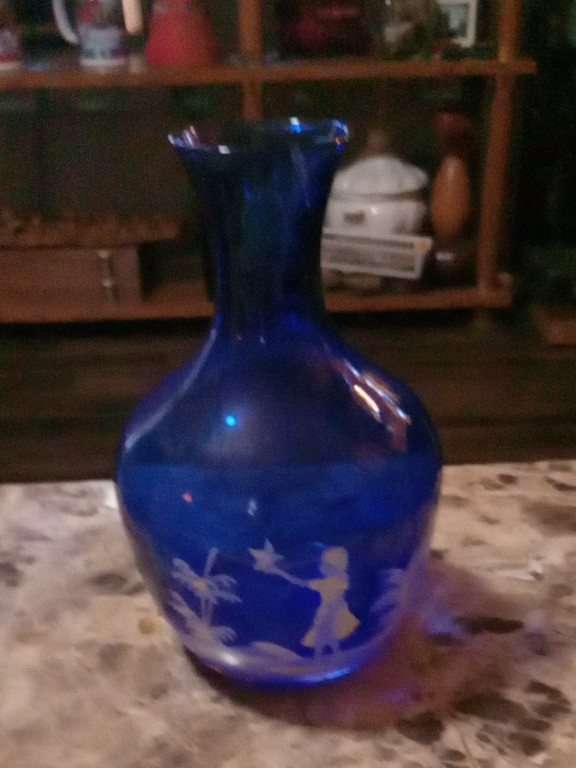 Cobalt blue glass vase with Mary Gregory-style white enamel decoration
