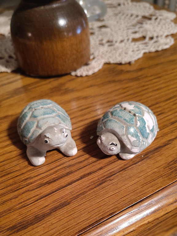 Ceramic turtle figurines with blue and white glazed shells