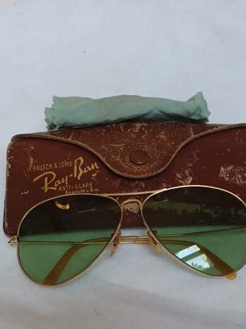 Vintage Bausch & Lomb Ray-Ban aviator sunglasses with 1/10 12K gold-filled frames and green lenses, with original case and cloth