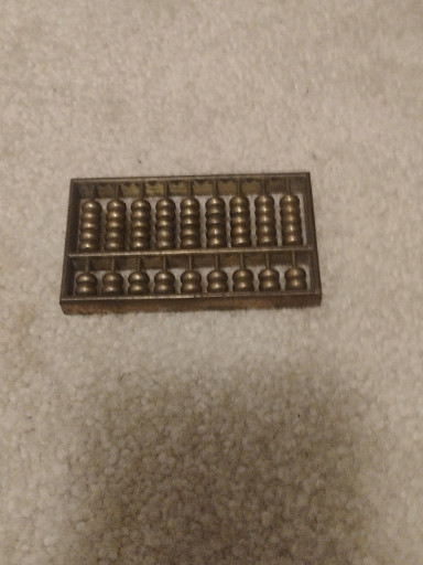 Miniature brass abacus