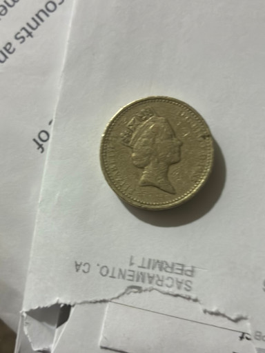 British One Pound coin featuring Queen Elizabeth II