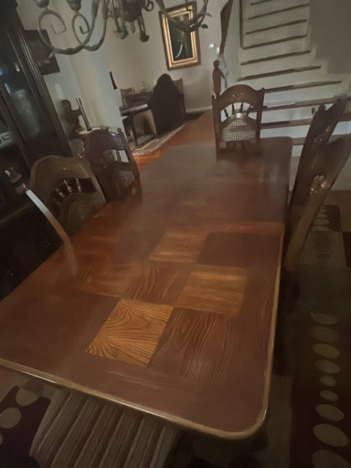 Wood dining table with parquet top and six chairs