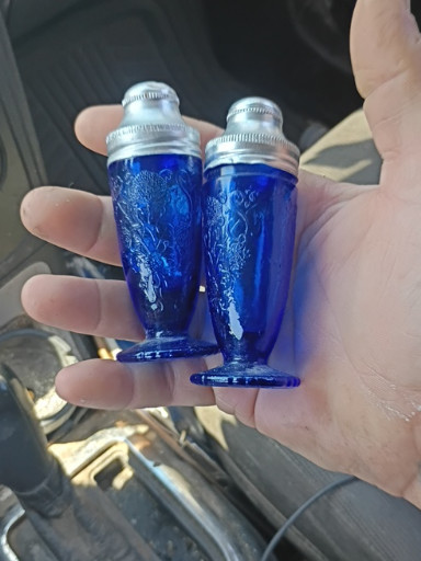 Cobalt blue Depression glass salt and pepper shakers in the 'Royal Lace' pattern by Hazel Atlas