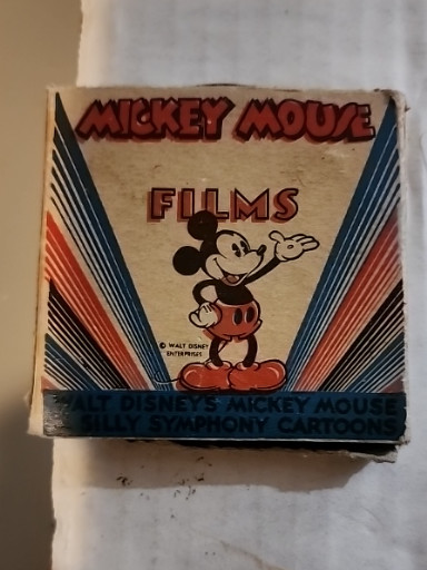 Vintage 8mm film reel titled 'Mickey Mouse Films' by Walt Disney Productions