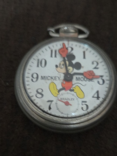 Metal pocket watch featuring Mickey Mouse by Bradley