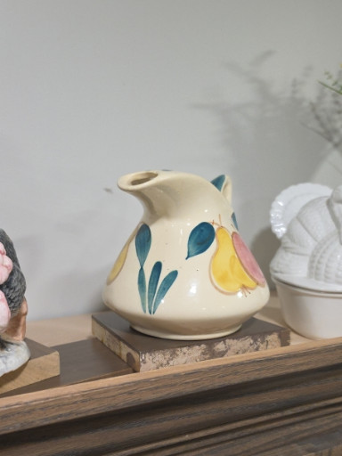 Ceramic pitcher with hand-painted fruit decoration by Purinton Pottery