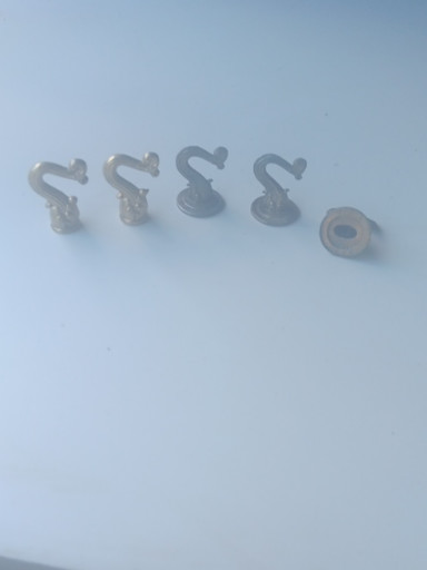 Set of brass curtain tie-back hooks and swag hooks