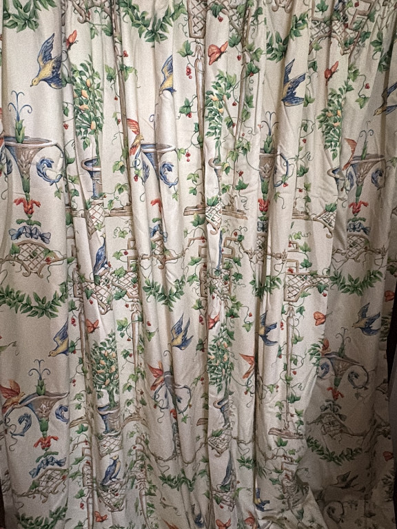 Cotton curtain panels with chinoiserie toile pattern featuring birds, urns, and botanical motifs