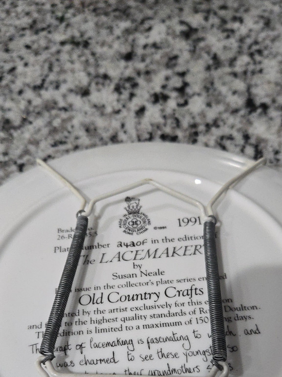 Porcelain collector plate titled 'The Lacemaker' by Susan Neale