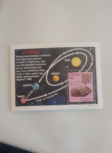 Postage stamp souvenir sheet titled 'ALH84001 Mars Meteorite' issued by Guyana