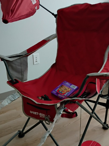 Portable folding camping chair with canopy by Sport-Brella