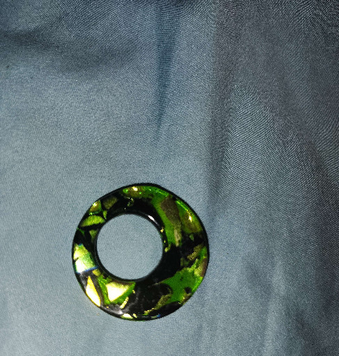 Fused glass pendant with green and black dichroic glass