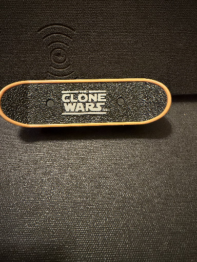 Plastic fingerboard skateboard titled 'Clone Wars' from McDonald's Happy Meal toy series
