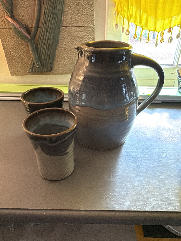 Stoneware pitcher and tumblers set with dark blue-green glaze