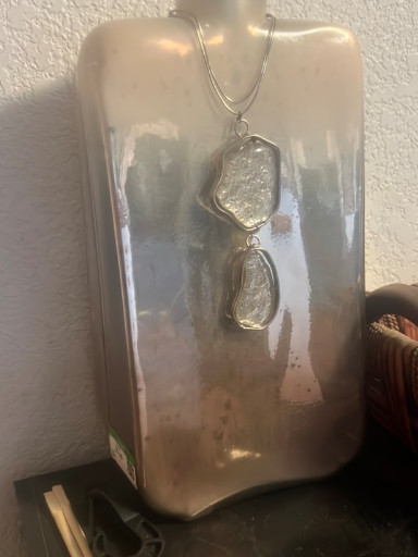 Mercury-filled glass vase pendant necklace, made in India