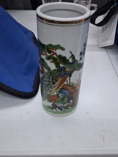 Porcelain cylindrical vase with peacock and floral decoration