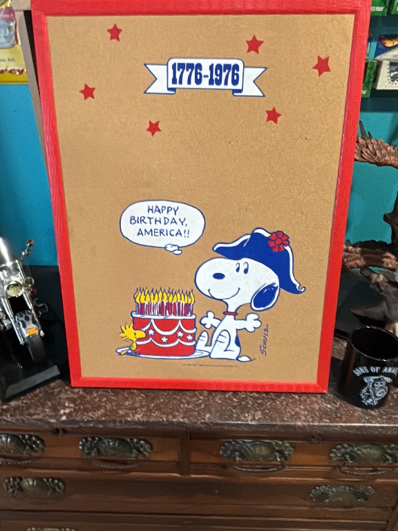Framed cork bulletin board featuring Peanuts Snoopy 'Happy Birthday, America!' bicentennial design (1776-1976)