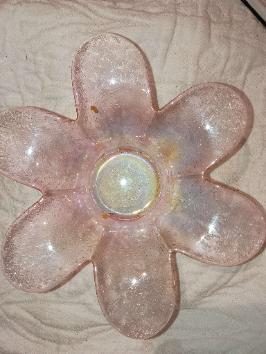 Pink iridescent glass flower-shaped bowl or candle holder, likely by Viking Glass