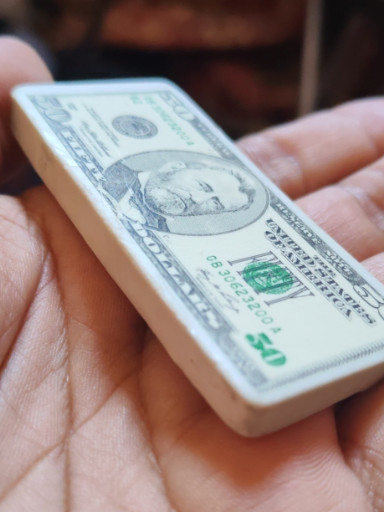 Goma de borrar con forma de billete de 100 dólares estadounidenses