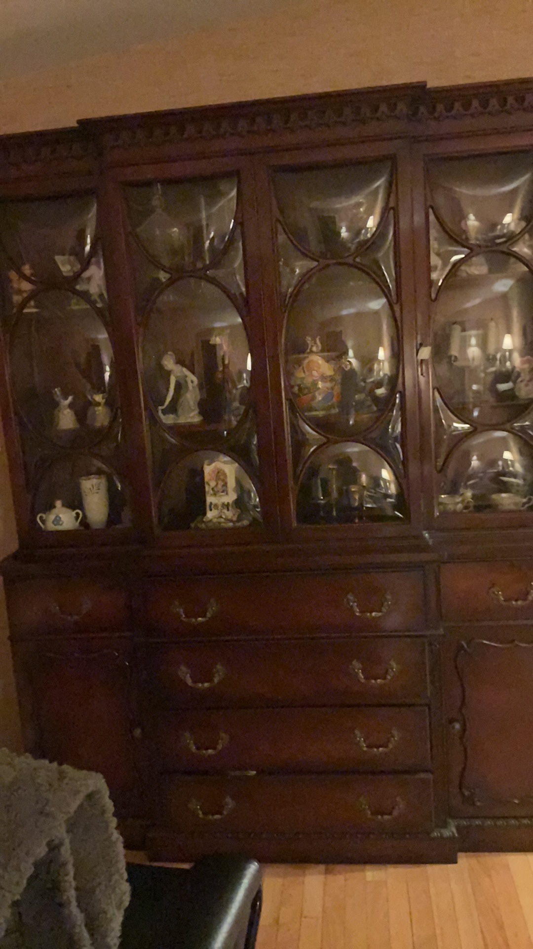 Mahogany breakfront china cabinet with bubble glass doors and hidden desk feature