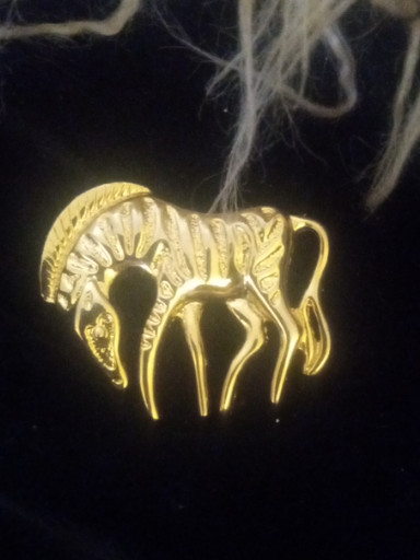 Gold-tone metal zebra brooch