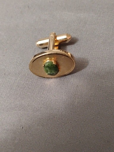 Gold-tone metal cufflinks with green jade cabochon by Dante